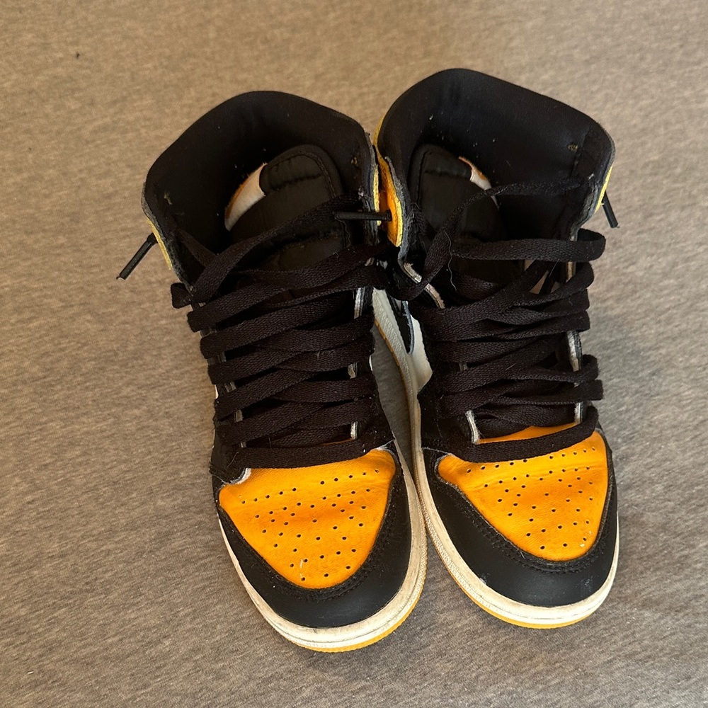 Nike Air Jordan Retro High Tops in Black, White, and Orange - Picture 4 of 11